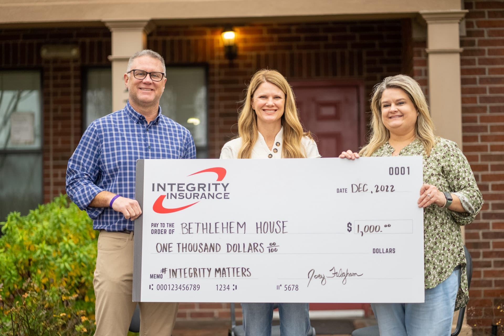 Integrity Insurance team donating to Bethlehem House